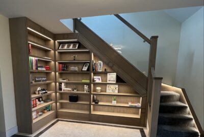 Bespoke closed bookcase and fitted cabinetry