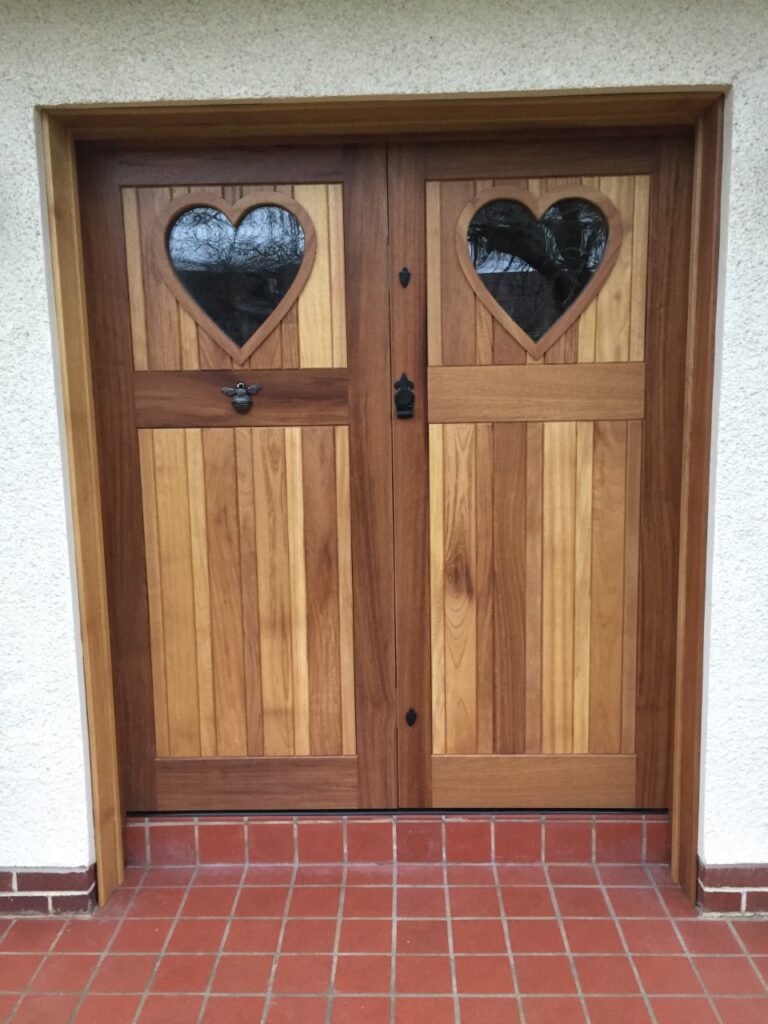 Bespoke timber door with heart detail